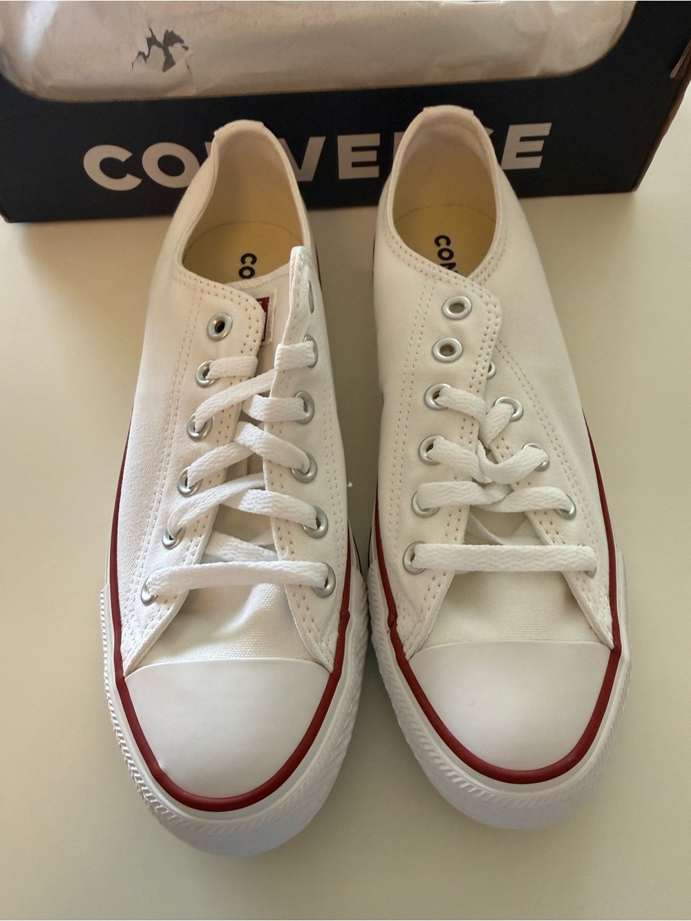 Converse White Low Top Sneakers with Red Trim